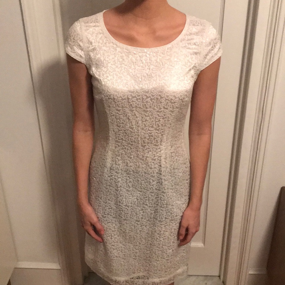 Fully lined, white sequin dress